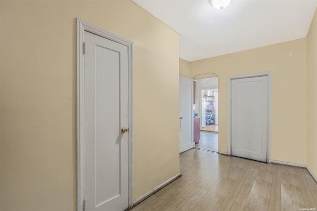 corridor featuring light hardwood / wood-style flooring