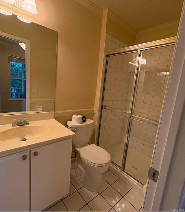 bathroom with an enclosed shower, crown molding, tile patterned floors, and toilet