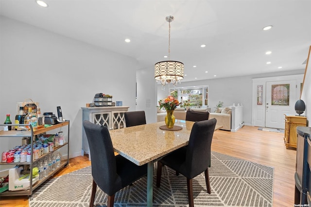 dining area with light hardwood / wood-style flooring