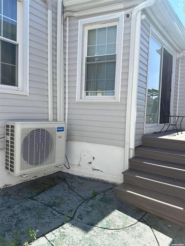 exterior space with ac unit