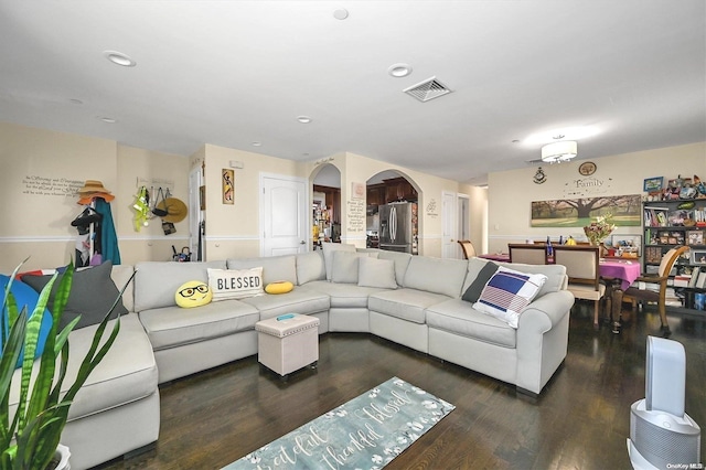 living room with dark wood-type flooring