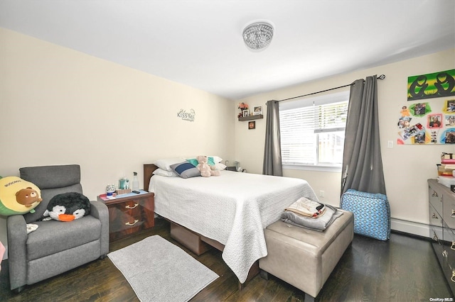 bedroom featuring a baseboard radiator and dark hardwood / wood-style floors