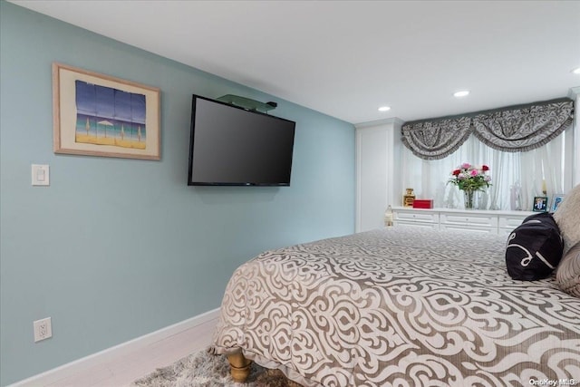 bedroom featuring light wood-type flooring