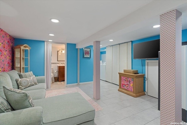 living room with light tile patterned flooring