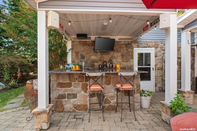 view of patio / terrace featuring exterior bar