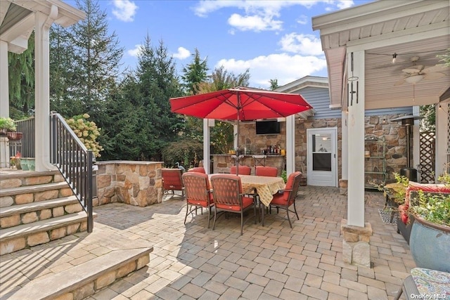 view of patio / terrace with ceiling fan