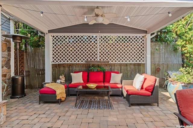 view of patio / terrace with an outdoor living space and ceiling fan