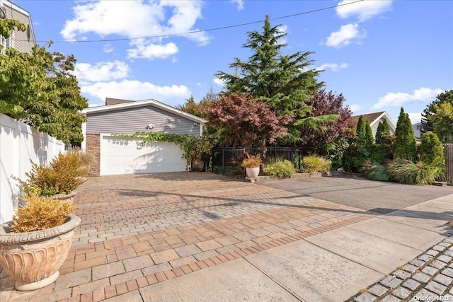 view of front of property with a garage