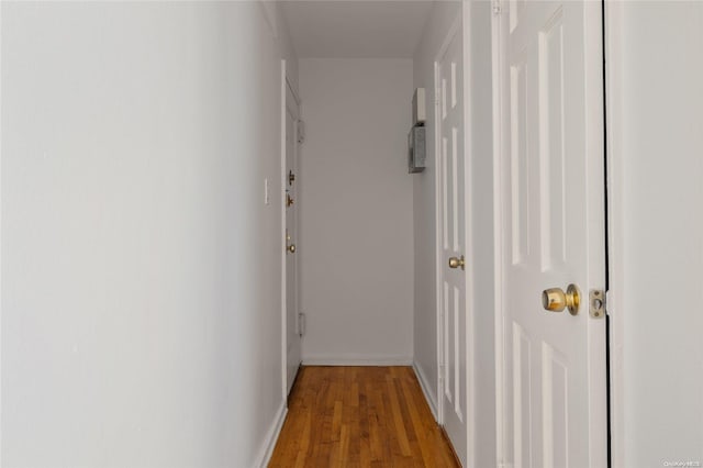 corridor featuring light hardwood / wood-style floors