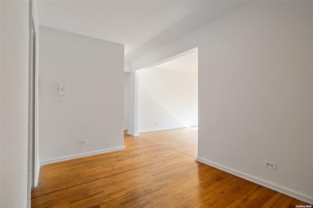 spare room with light hardwood / wood-style floors