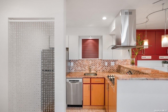 kitchen featuring island exhaust hood, light stone countertops, stainless steel dishwasher, sink, and hanging light fixtures