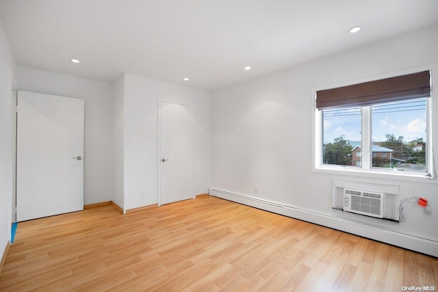 empty room featuring light hardwood / wood-style floors