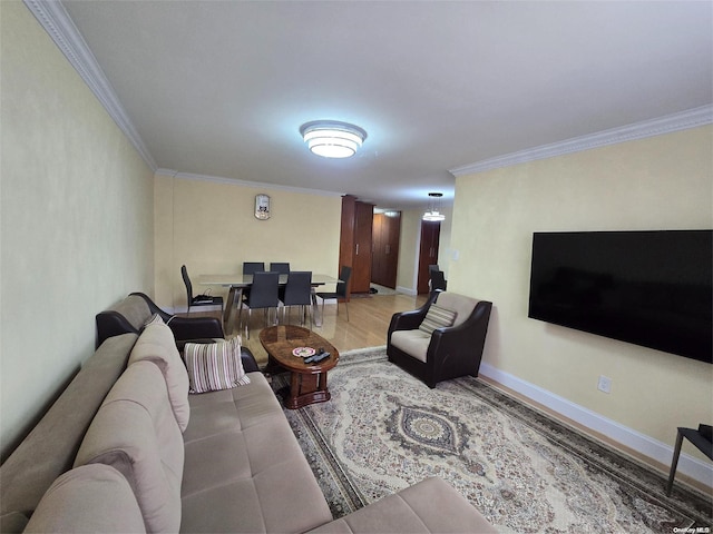 living room featuring crown molding and wood-type flooring