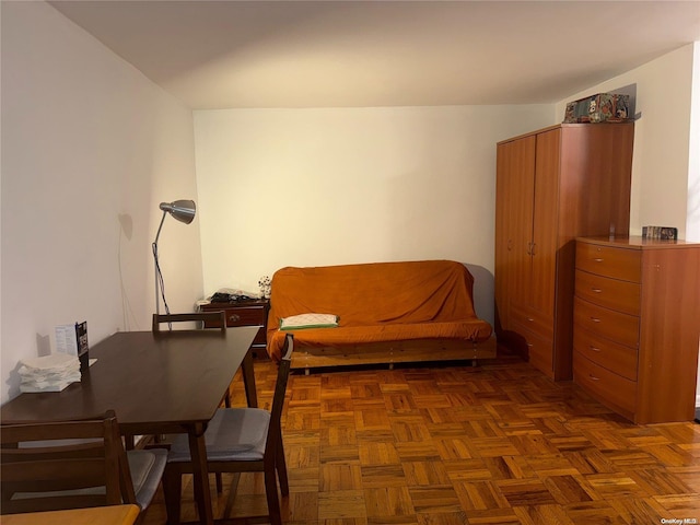 sitting room featuring dark parquet floors