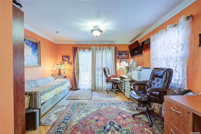 office space with crown molding and light wood-type flooring