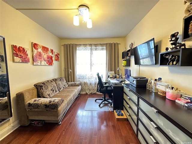 office area with a chandelier and dark hardwood / wood-style floors