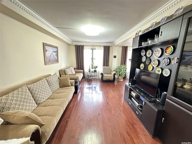 living room with dark hardwood / wood-style floors and ornamental molding