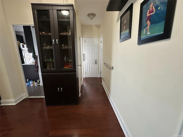 hall featuring dark hardwood / wood-style flooring