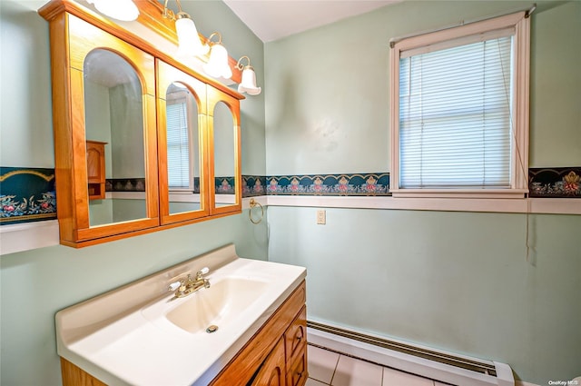 bathroom with tile patterned flooring and vanity