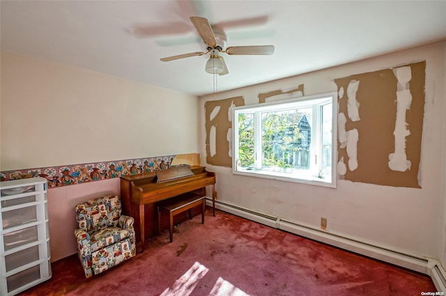 living area with ceiling fan, carpet, and a baseboard radiator