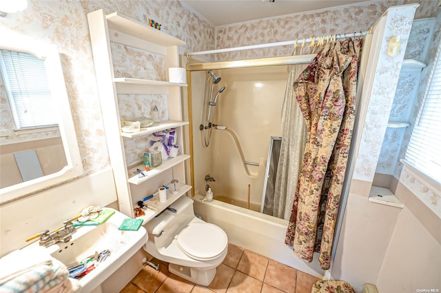 full bathroom with tile patterned floors, a wealth of natural light, shower / tub combo, and toilet