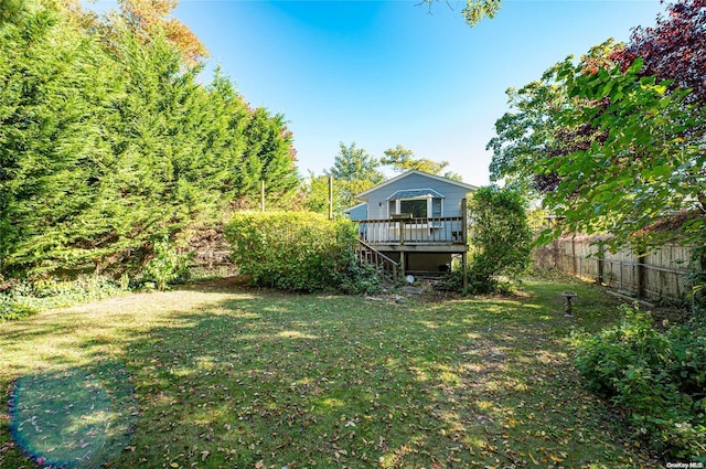 view of yard featuring a deck