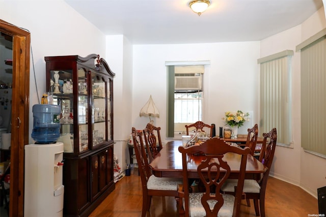 dining space featuring hardwood / wood-style flooring