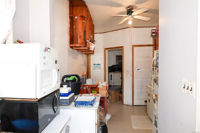 kitchen featuring ceiling fan