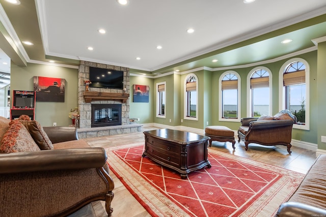 living room with crown molding and a stone fireplace