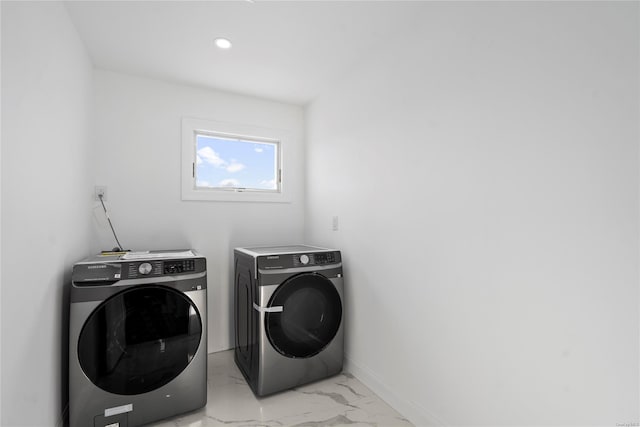 laundry area featuring separate washer and dryer