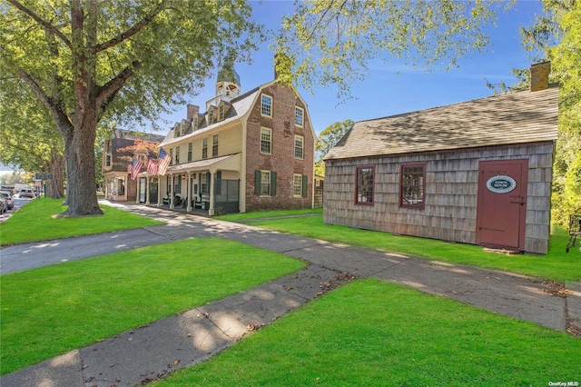 surrounding community featuring a yard