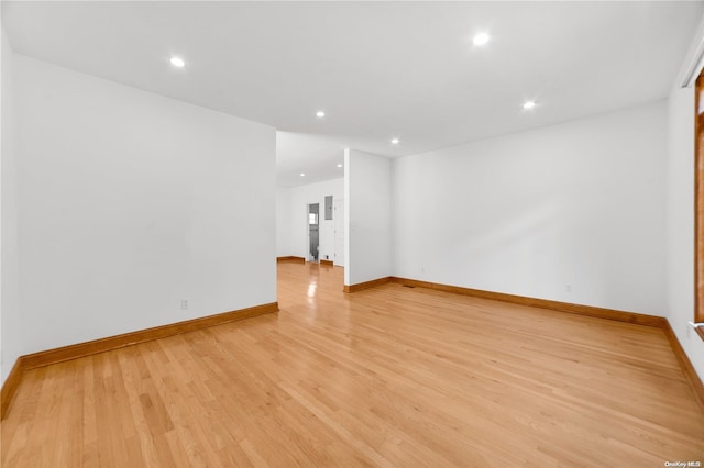 unfurnished room featuring light wood-type flooring