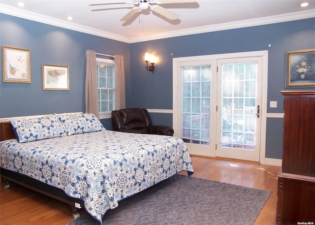 bedroom with access to outside, ceiling fan, hardwood / wood-style floors, and ornamental molding