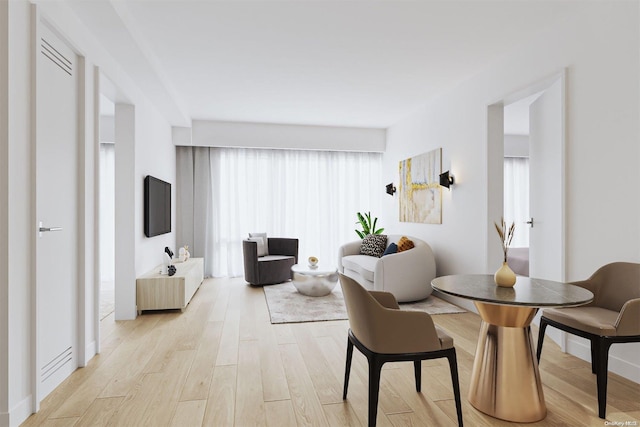 dining area featuring light wood-type flooring