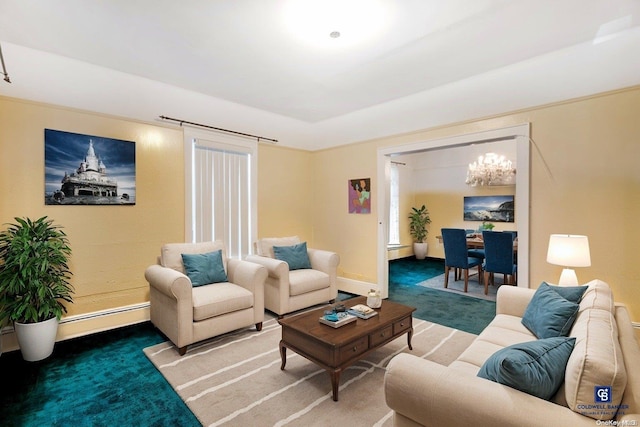 living room with carpet floors, a chandelier, and a baseboard heating unit