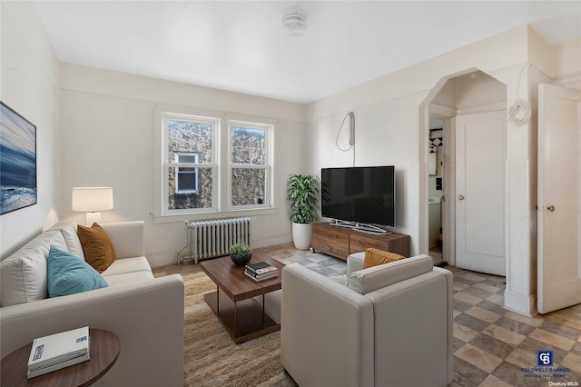 living room featuring radiator