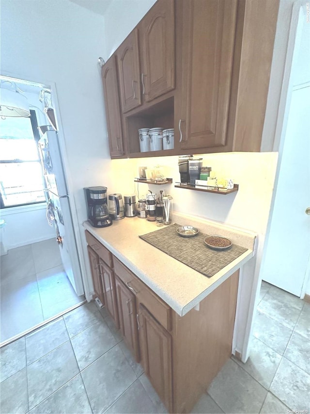 kitchen featuring light tile patterned floors