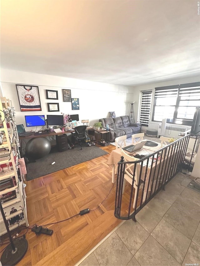 living room with tile patterned floors