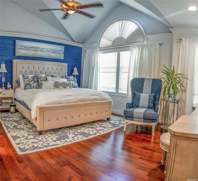 bedroom with ceiling fan, wood-type flooring, and vaulted ceiling