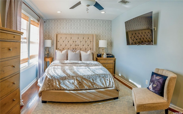 bedroom featuring ceiling fan and light wood-type flooring