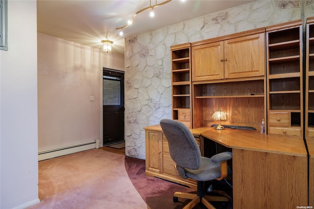 home office featuring dark colored carpet, track lighting, and a baseboard heating unit