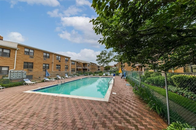 view of pool with a patio area