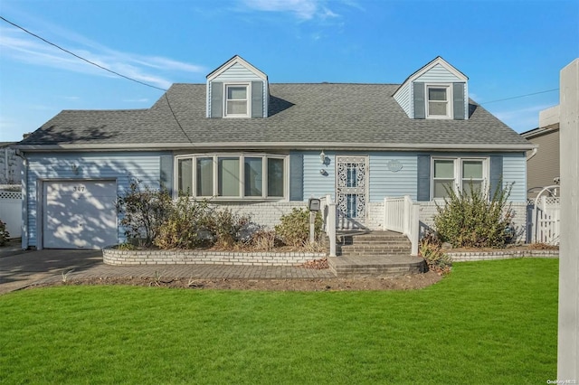 cape cod home featuring a front lawn and a garage