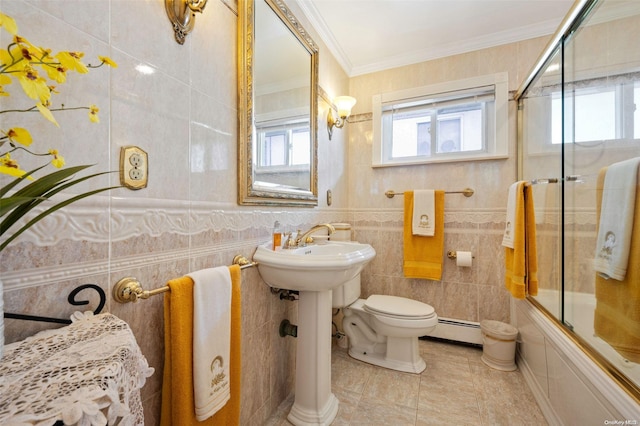 bathroom featuring crown molding, toilet, enclosed tub / shower combo, tile walls, and a baseboard radiator