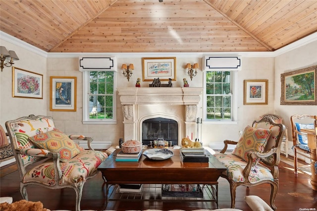 living area with a healthy amount of sunlight, lofted ceiling, and wood ceiling