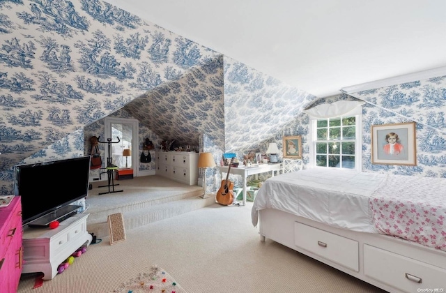 bedroom featuring carpet and vaulted ceiling