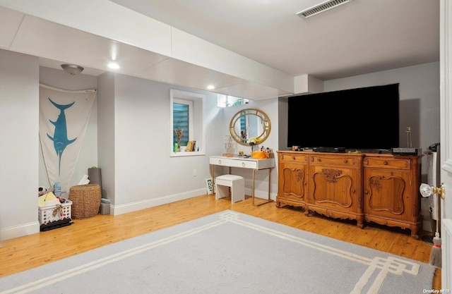 477 Montauk Hwy, Westhampton Beach, NY 11978 - living area featuring light wood-style floors and baseboards