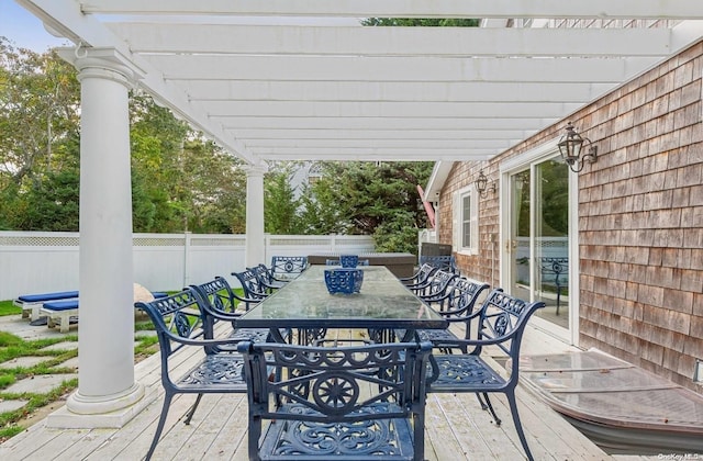 view of patio featuring a pergola and a wooden deck