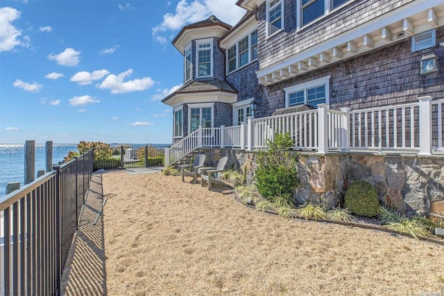 view of property's community with a water view