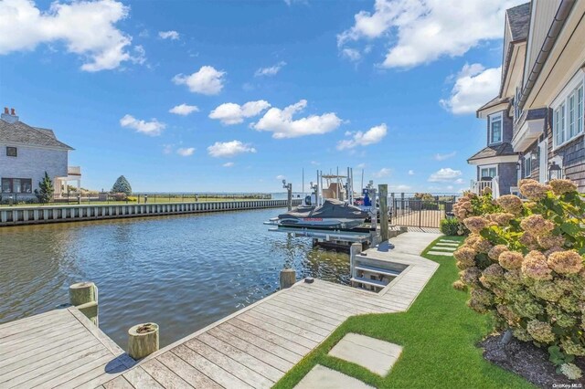 view of dock with a water view